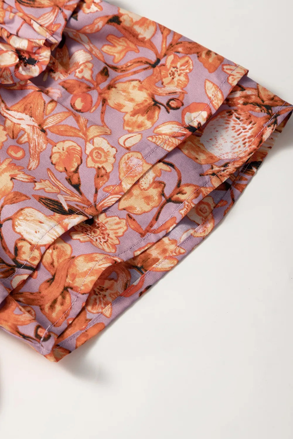 Floral Ruffled Layered Short Sleeve Tie Neck Blouse