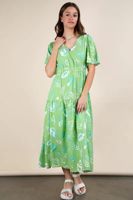 Trendy V-Neck Printed Midi Dress - Flattering Resort Wear with Ruched Design