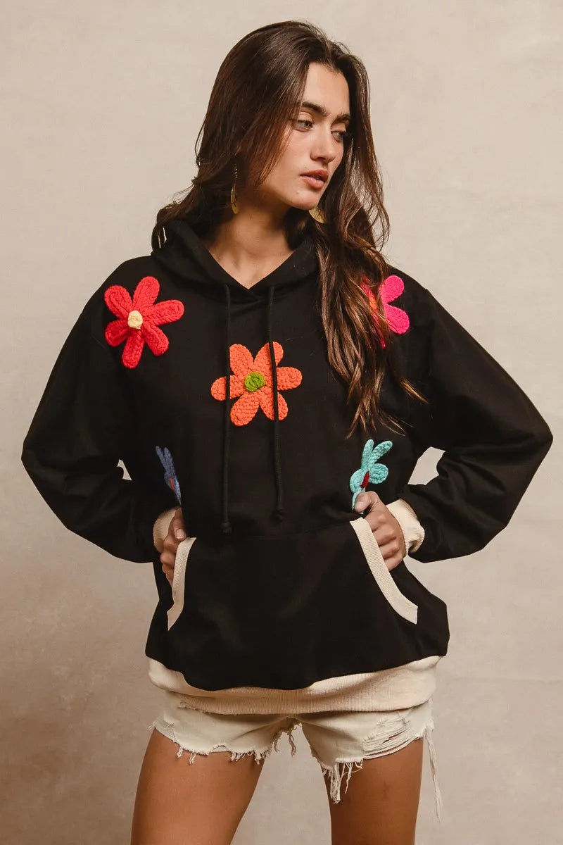 Trendy BiBi Patched Hoodie Top with Pocket, Drawstring, and Unique Embellishments