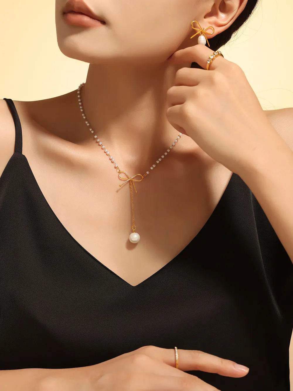 Elegant Stainless Steel Bow Pendant Necklace with Synthetic Pearls & 18K Gold-Plating - Store 42