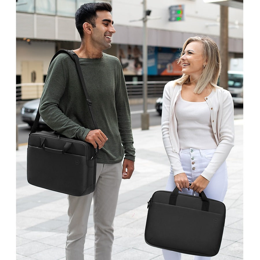 Two individuals smiling while showcasing the Dell EcoLoop Pro 16" Notebook Carrying Case, highlighting its versatile carrying options in an urban setting.