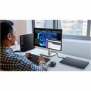 A professional using the Dell U2424HE 23.8" FHD Monitor in a modern workspace, demonstrating its ergonomic design and superior color accuracy for enhanced productivity.