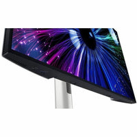 Close-up of the Dell U2424HE 23.8" FHD Monitor's sleek design, highlighting its edge LED backlighting and impressive visual performance for creative projects.