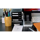 Organized workspace featuring the Seiko 203 DPI Smart Label Printer, showcasing productivity with pens and an envelope, emphasizing smart labeling solutions.