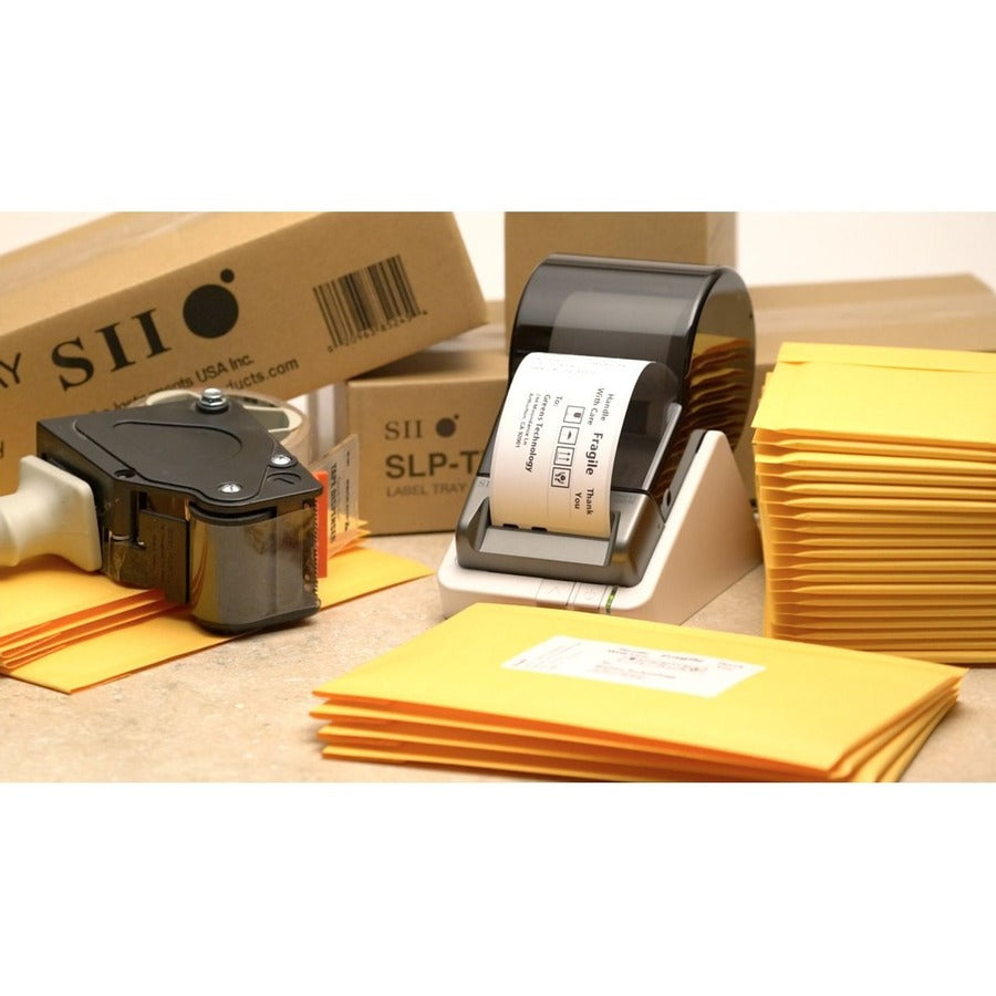 Seiko 203 DPI Smart Label Printer in action, surrounded by packaging materials, emphasizing efficient labeling for shipping and organization.