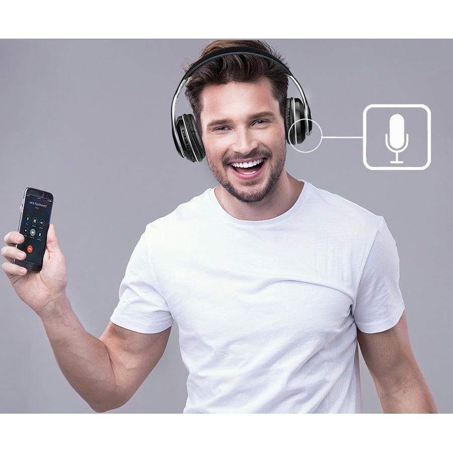 A cheerful man using the Adesso Xtream P500 Bluetooth Headset with Noise-Cancelling Microphone while holding a smartphone, showcasing wireless audio convenience.