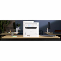 Canon MF289dw Monochrome All-in-One Wireless Laser Printer positioned on a modern office desk, illustrating its professional integration for enhanced productivity.