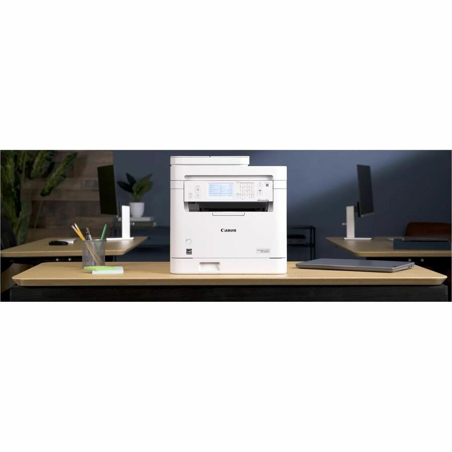 Canon MF289dw Monochrome All-in-One Wireless Laser Printer positioned on a modern office desk, illustrating its professional integration for enhanced productivity.