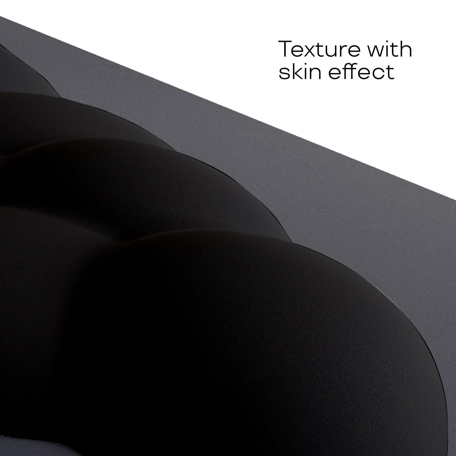 Close-up view of the CloudWrist Black Memory Foam Wrist Rest by Kokovolta, showcasing its unique texture with a skin effect that provides a luxurious feel.