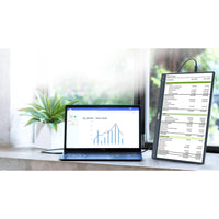 ASUS ZenScreen MB16ACV 15.6" Portable Full HD IPS Monitor set against a bright window, demonstrating its ideal use for multitasking and work efficiency.