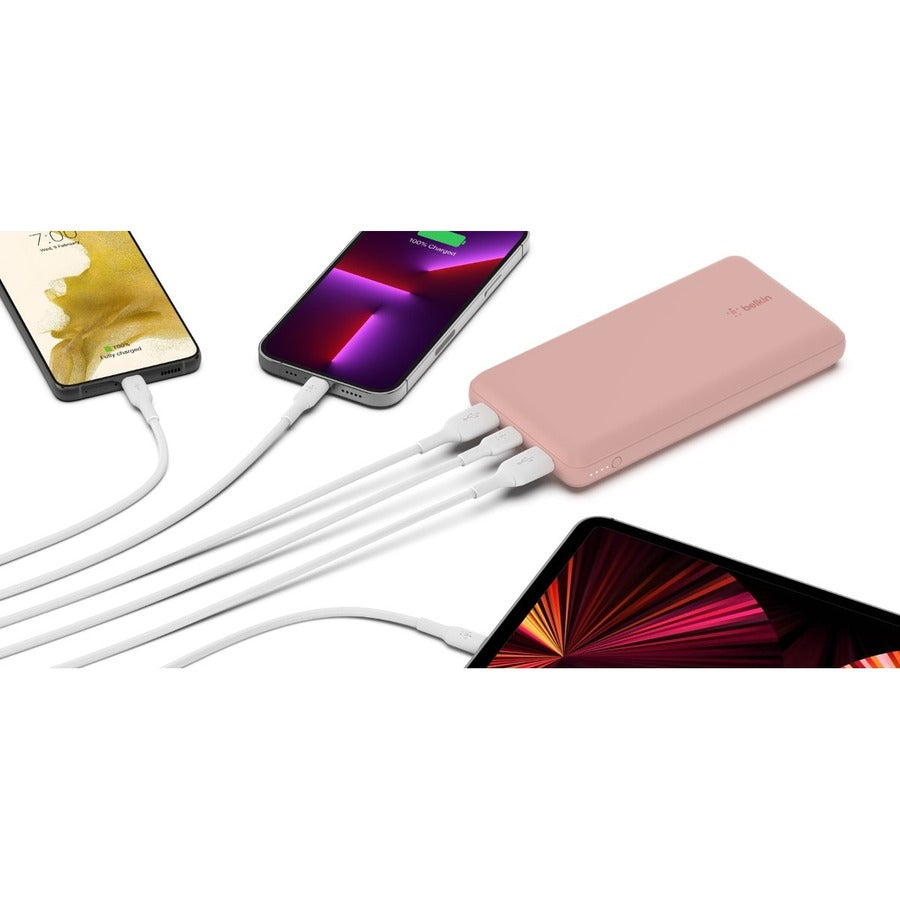 Belkin BoostCharge 20K Power Bank with three devices charging simultaneously, showcasing two USB-A and one USB-C port in a stylish design. Ideal for keeping your devices powered on the go.