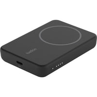 Belkin Magnetic Wireless Power Bank 5000mAh for iPhone 13 Pro & 12, sleek black design with a circular charging pad, ideal for fast charging on-the-go.