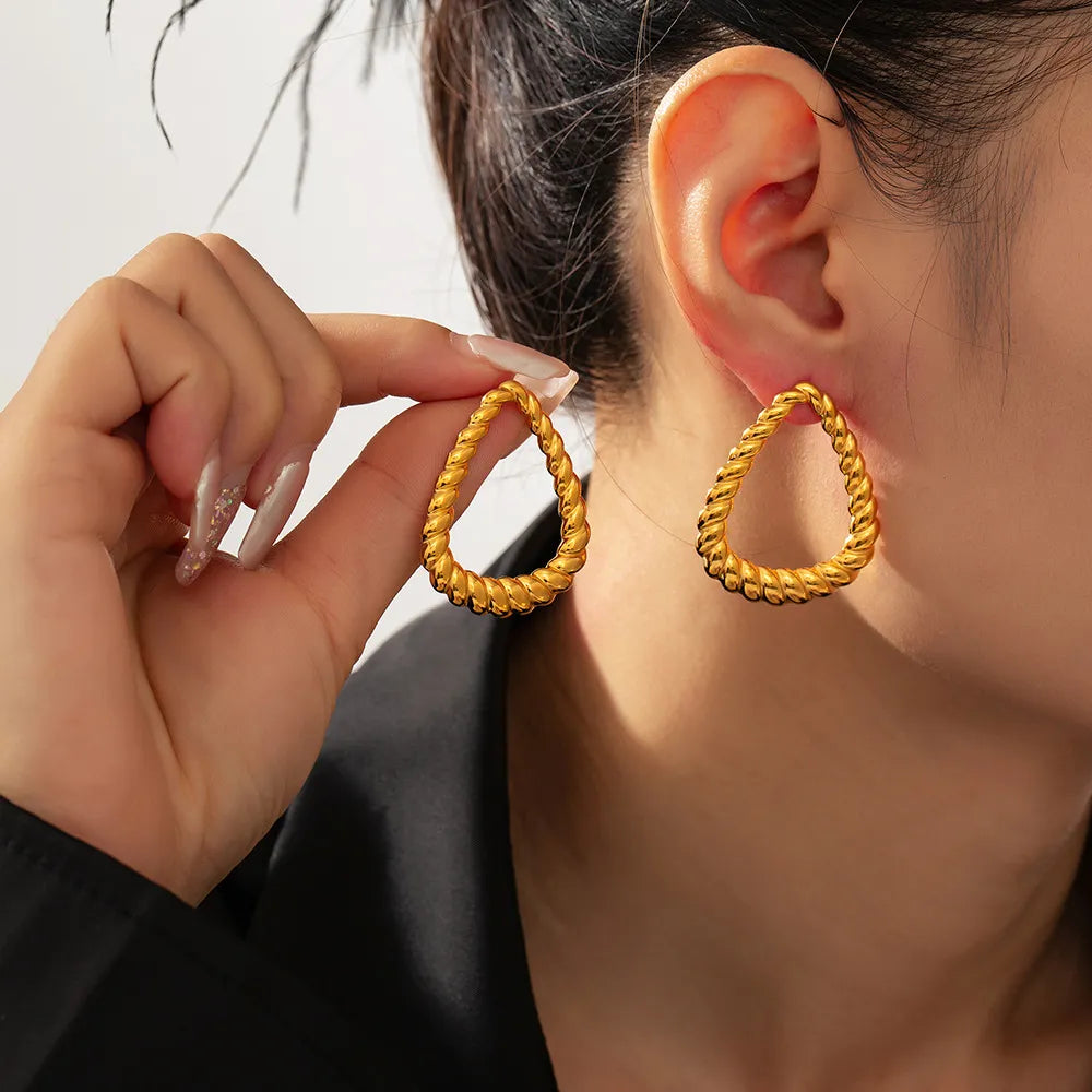 Elegant 18K Gold-Plated Twisted Earrings in Titanium Steel - Imported Luxe Fashion Jewelry