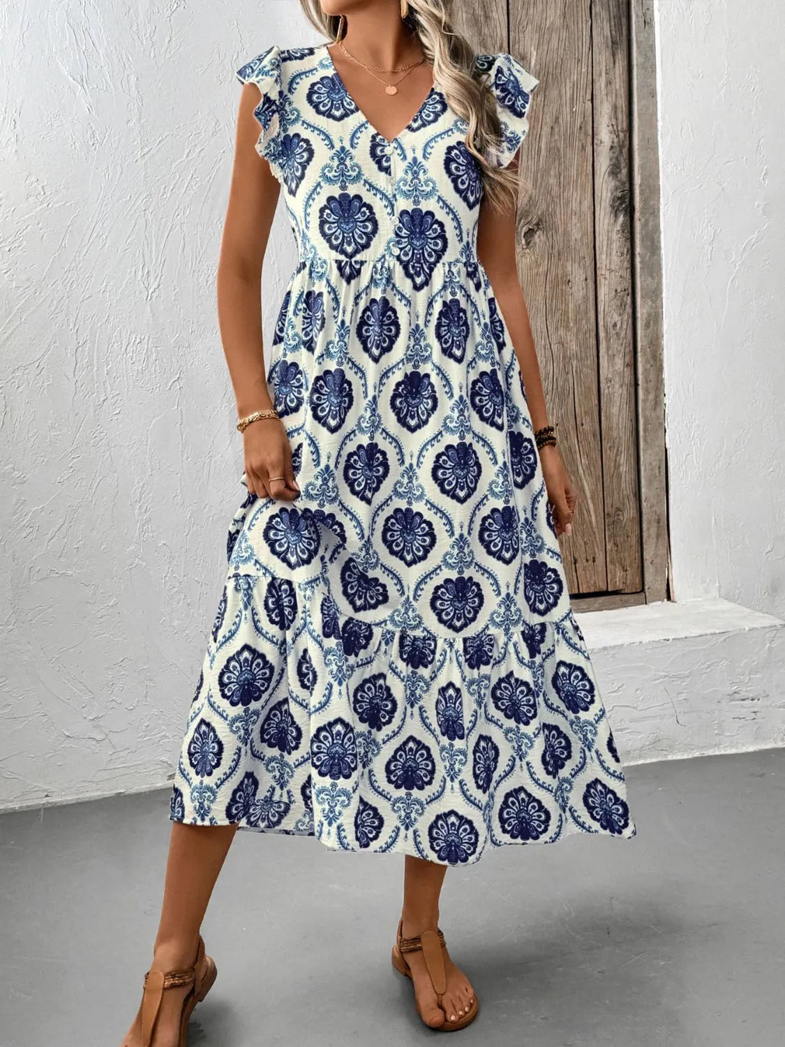 Floral Printed V-Neck Cap Sleeve Dress with Ruffles and Decorative Buttons
