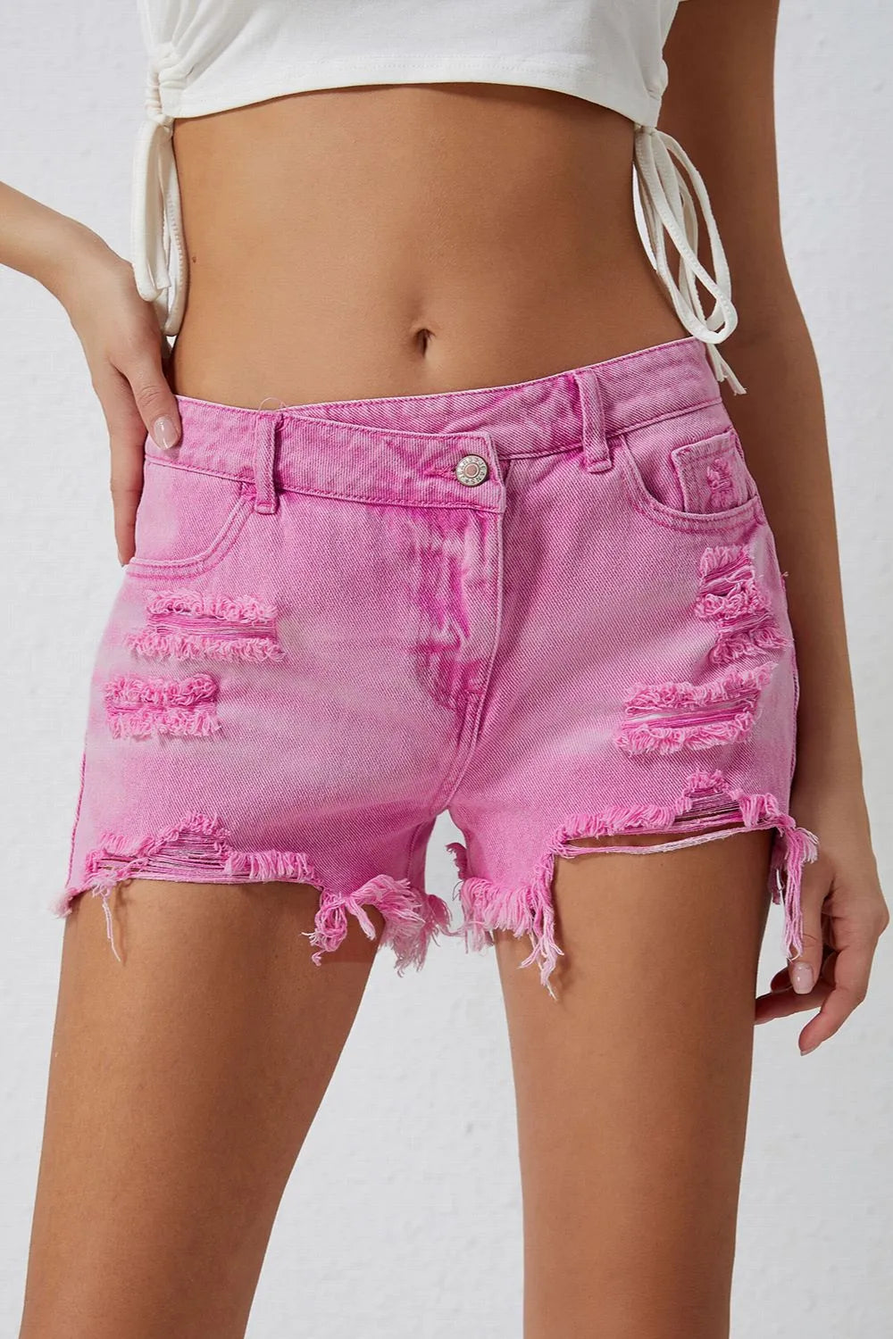 Trendsi High Rise Crossover Waist Denim Shorts with Distressed Raw Hem - Effortless Style