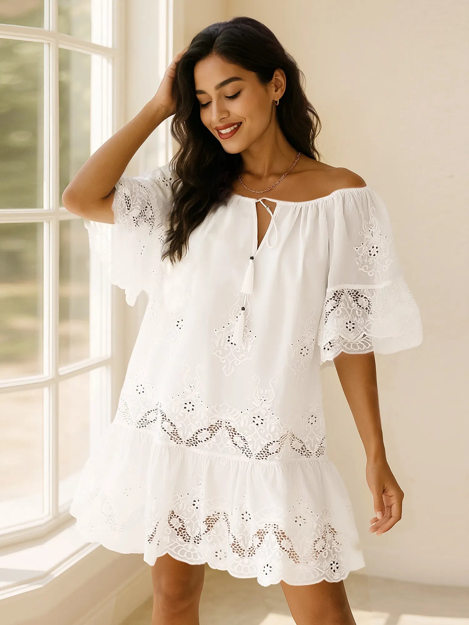 100% Cotton Eyelet Embroidered Dress with Tassel Tie Neck and Ruffled Detail
