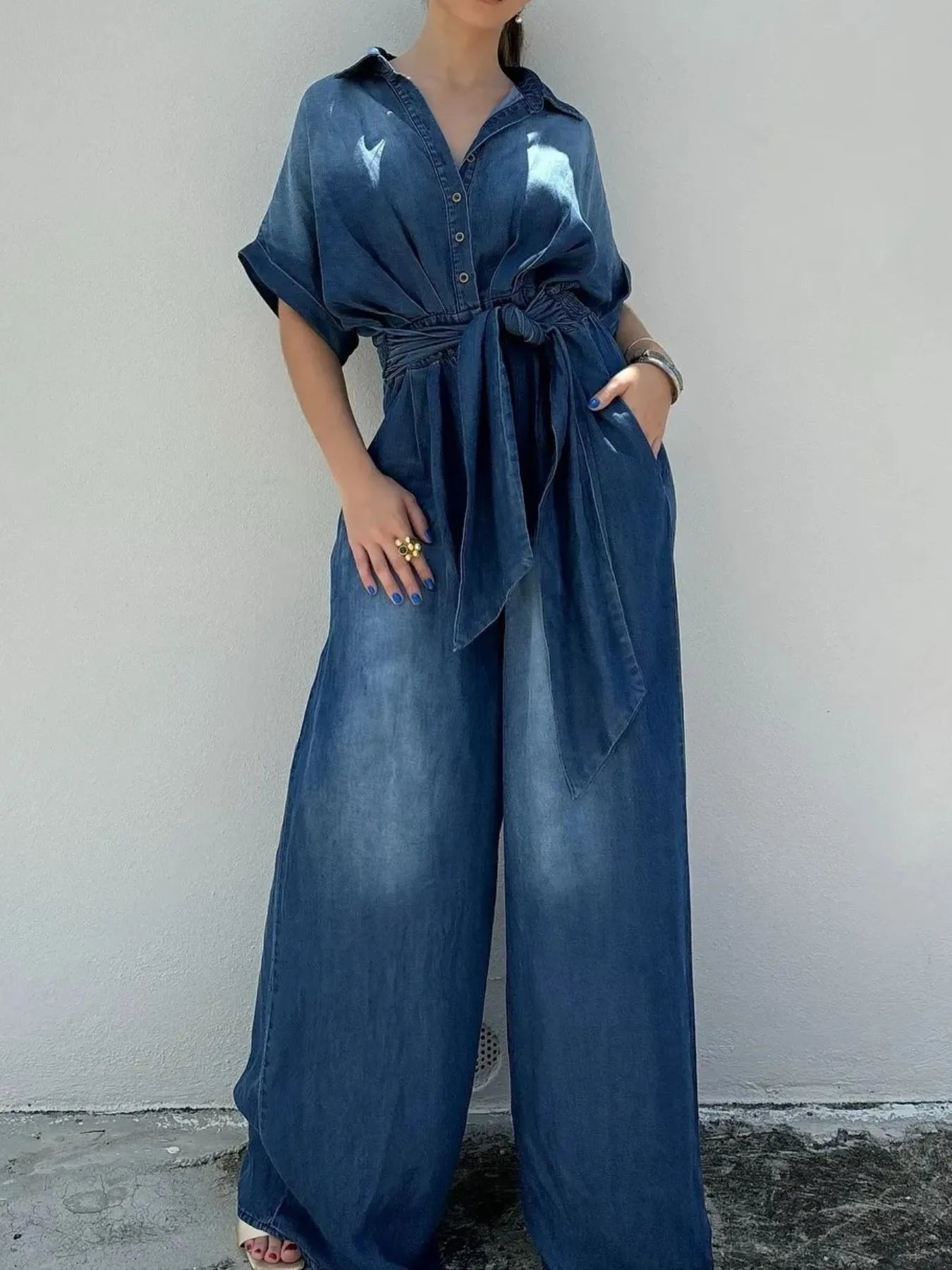 Button Front Wide Leg Denim Jumpsuit with Belt, Pockets, and Smocked Design - Trendsi