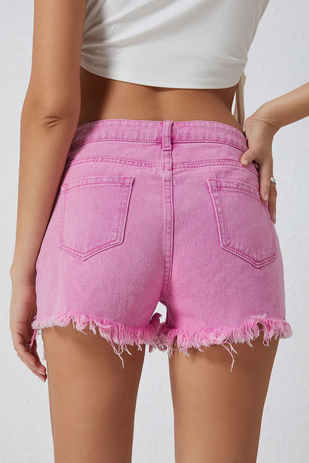 Trendsi High Rise Crossover Waist Denim Shorts with Distressed Raw Hem - Effortless Style