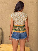 Ruffled Floral Tie Neck Cap Sleeve Blouse