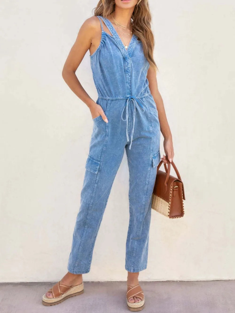 Women’s V-Neck Sleeveless Denim Jumpsuit with Pockets and Adjustable Drawstring