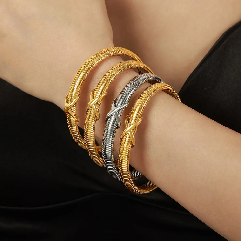 Elegant 18K Gold-Plated Titanium Steel Spring Shape Bracelet - Lightweight & Durable Design