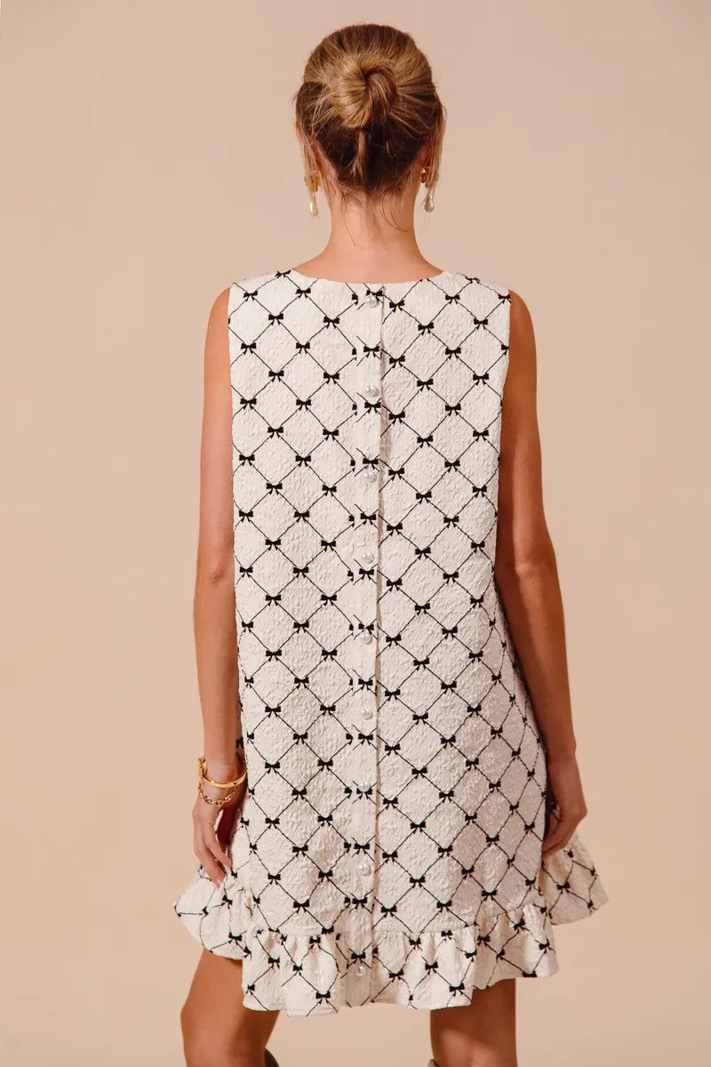 Charming Bow Print Mini Ruffle Dress - Sleeveless Black & White Dress for Casual Elegance