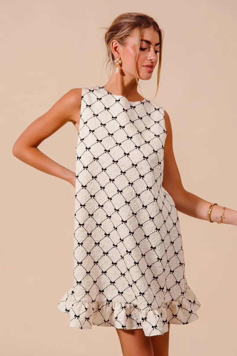 Charming Bow Print Mini Ruffle Dress - Sleeveless Black & White Dress for Casual Elegance