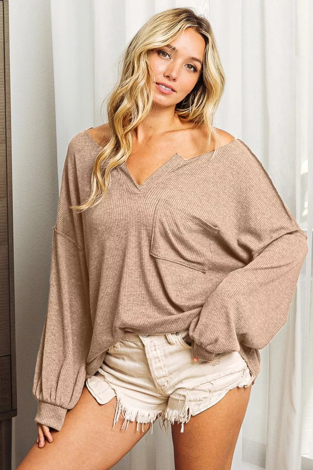 Trendy Exposed Seam Long Sleeve Top - Urban Style, Comfortable Fit, and Modern Design