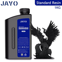 JAYO 3D Printer Resin - ABS-Like, Water Washable, 395-405nm, Durable High-Detail Prints alongside a dramatic winged creature model, revealing the resin's quality and performance in 3D printing.