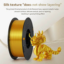 Silk PLA filament from KINGROON with a golden glossy finish, paired with a printed dragon model demonstrating the unique layering-free texture for stunning results.