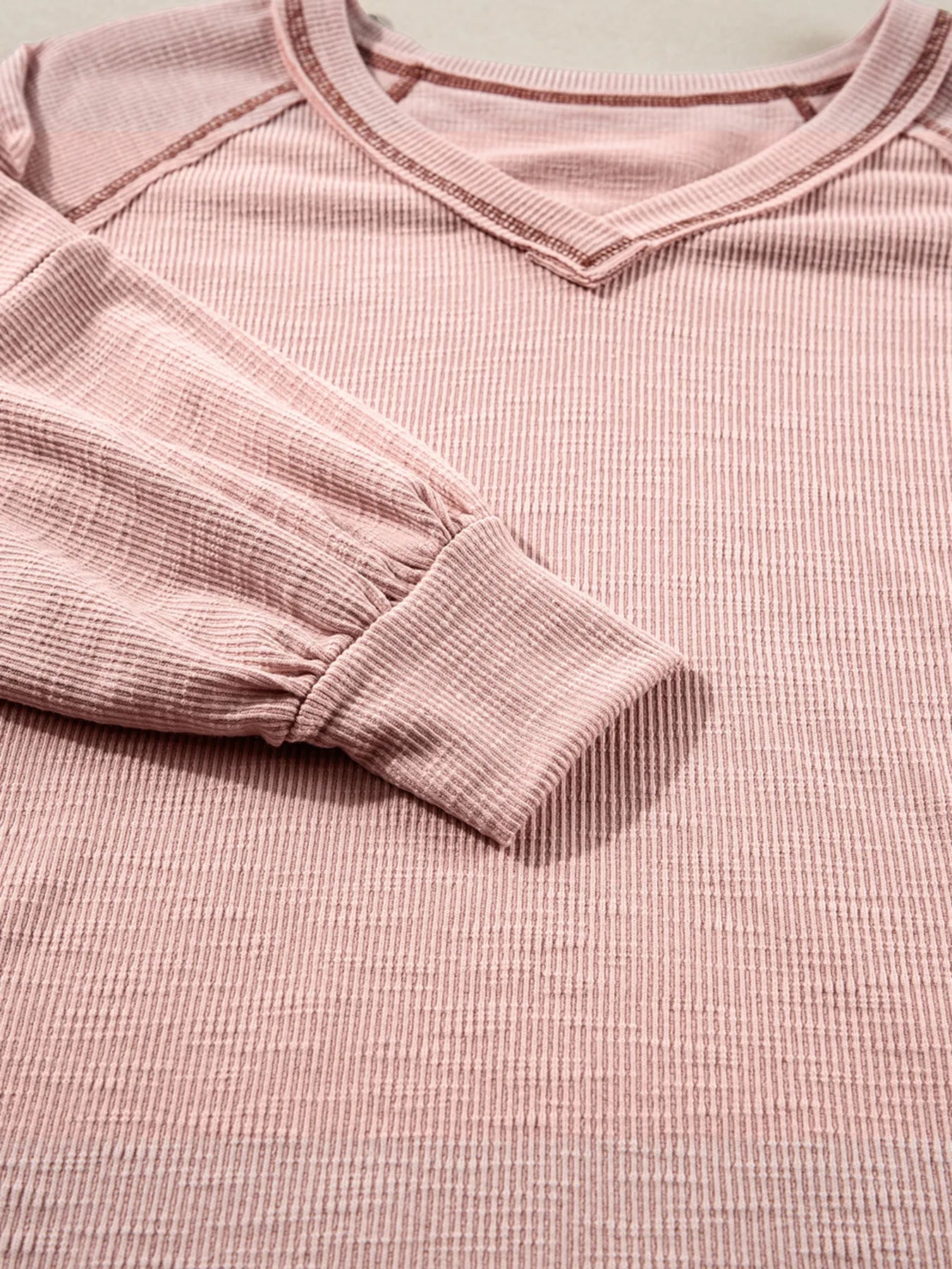 Exposed Seam Ribbed Knit V Neck Top