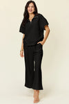 Double Take Full Size Texture Half Zip Short Sleeve Top and Pants Set Black