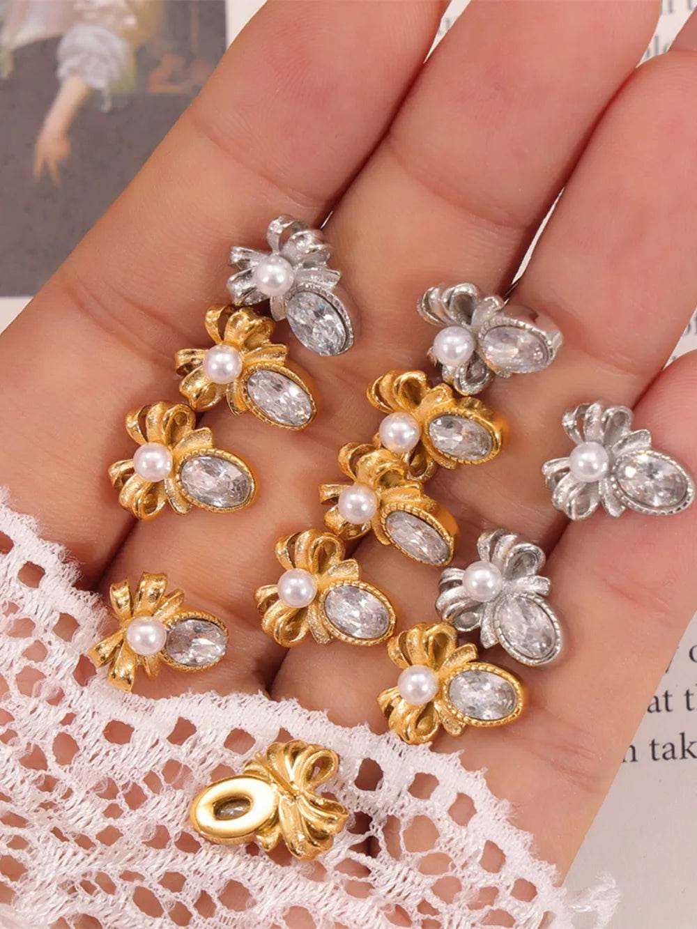 Elegant 18K Gold-Plated Titanium Steel Bow Stud Earrings with Zircon and Shell Bead Accents