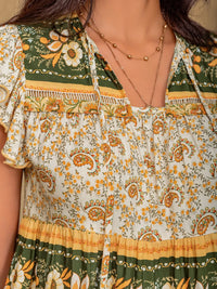 Ruffled Floral Tie Neck Cap Sleeve Blouse