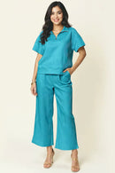 Double Take Full Size Texture Half Zip Short Sleeve Top and Pants Set Light Blue