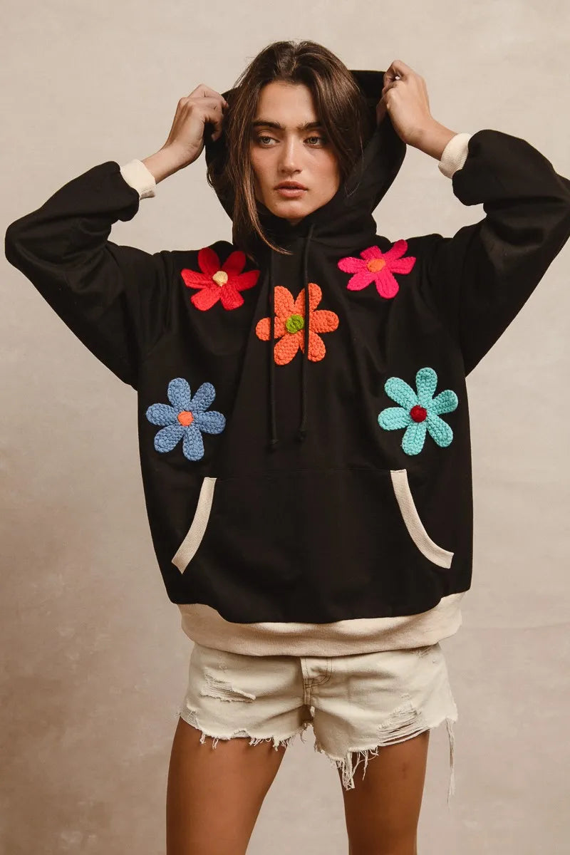 Trendy BiBi Patched Hoodie Top with Pocket, Drawstring, and Unique Embellishments