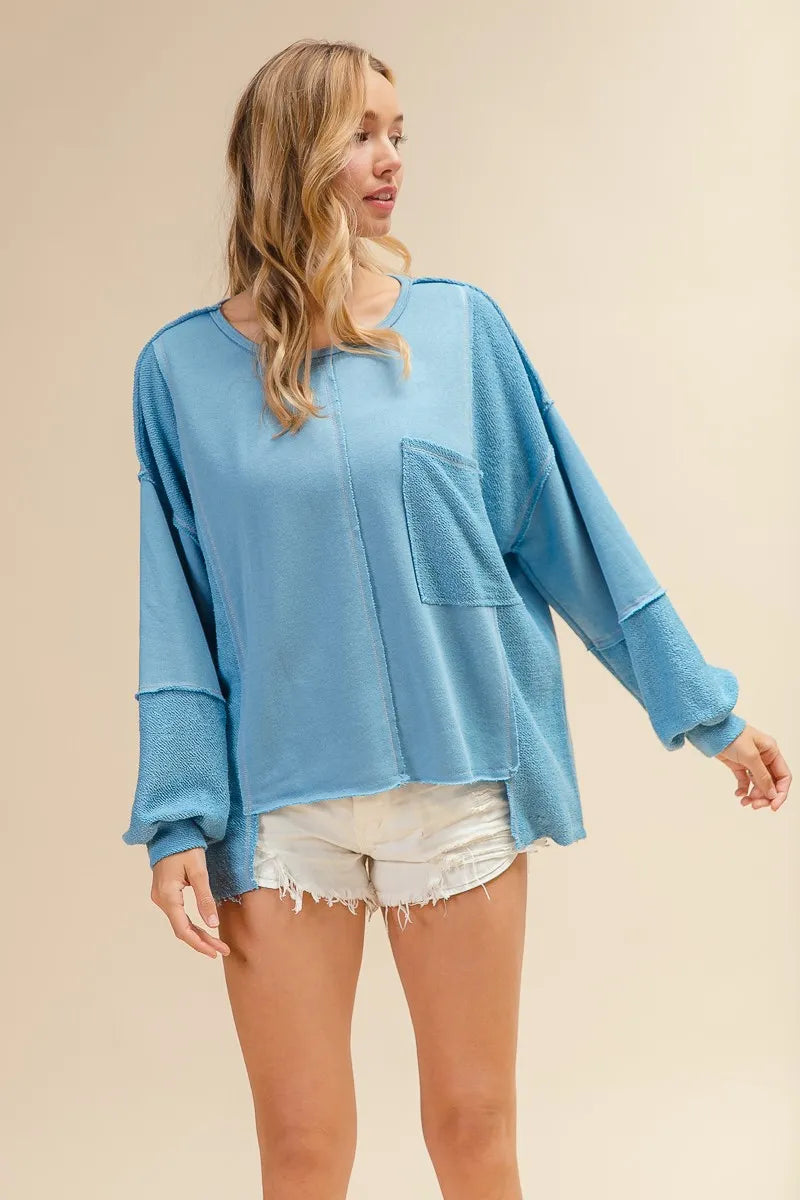BiBi Oversized Pocket Sweatshirt with Raw Hem | Chic & Cozy Lounge Wear