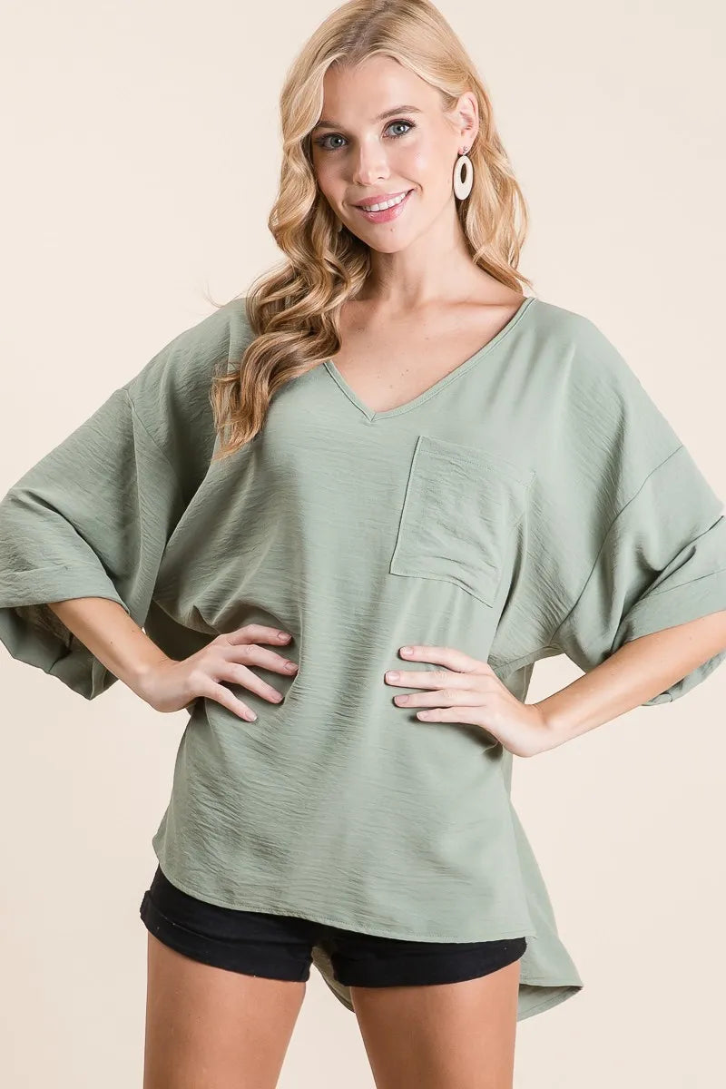 BiBi Oversized Sage Green V-Neck Blouse with Pocket and Rolled Cuffs for Effortless Style