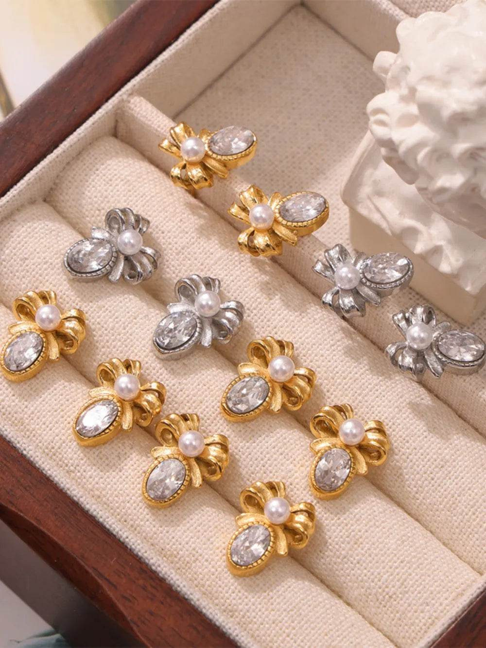 Elegant 18K Gold-Plated Titanium Steel Bow Stud Earrings with Zircon and Shell Bead Accents