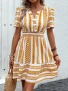 Perfee Geometric Notched Short Sleeve Mini Dress Mustard