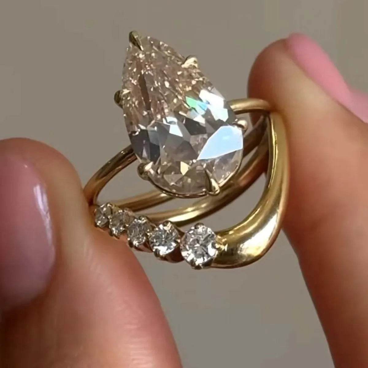 1.5 Carat Moissanite Teardrop Ring Set in 18K Gold-Plated Sterling Silver with Certificate