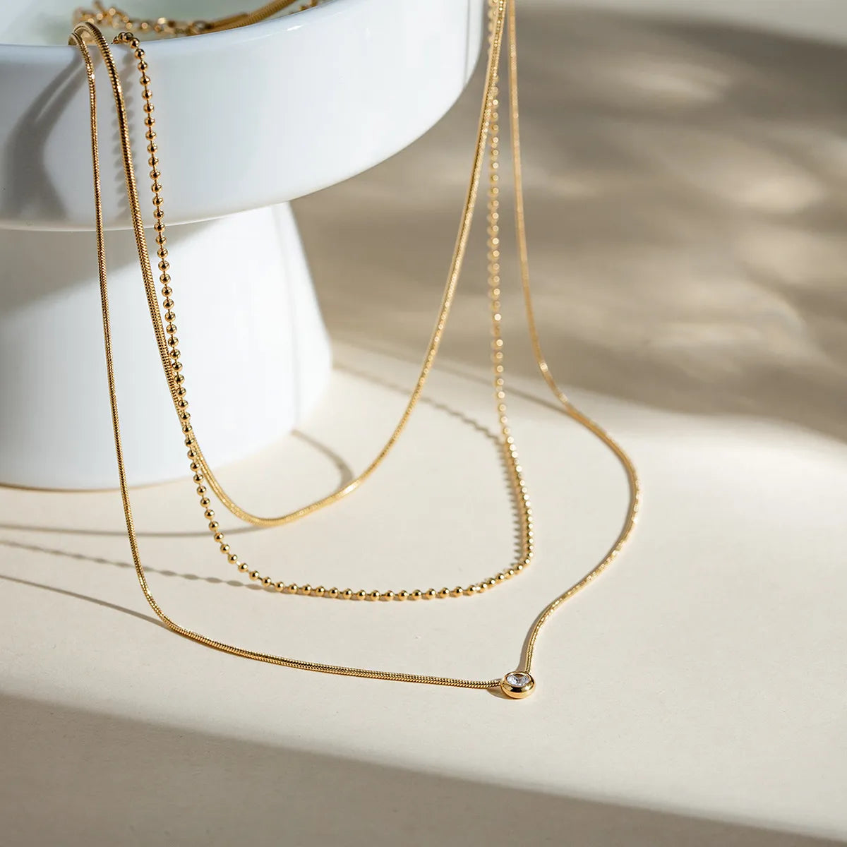 Elegant 18K Gold-Plated Triple-Chain Layered Necklace with Pearl Pendant